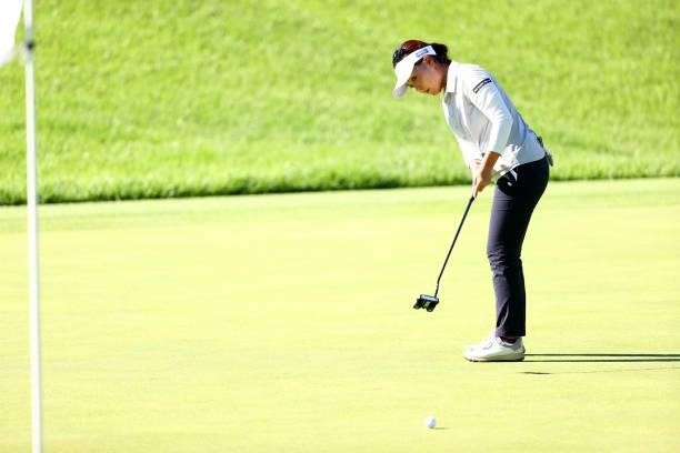 Serena Aoki of Japan attempts a putt on the 17th green during first round of the GMO Internet Ladies Samantha Thavasa Global Cup at Eagle Point Golf...