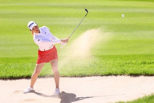 Akira Yamaji of Japan hits out from a bunker on the 18th hole during first round of the GMO Internet Ladies Samantha Thavasa Global Cup at Eagle...