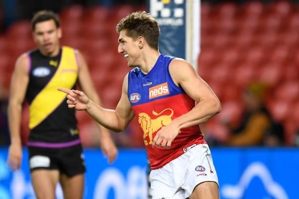 Zac Bailey of the Lions celebrates kicking a goal during the round 18 AFL match between the Richmond Tigers and the Brisbane Lions at Metricon...