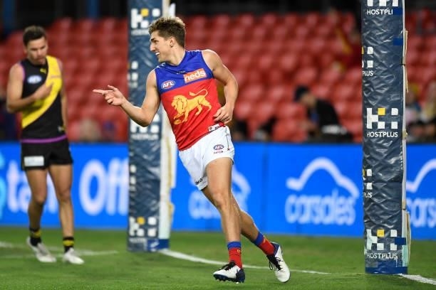 Zac Bailey of the Lions celebrates kicking a goal during the round 18 AFL match between the Richmond Tigers and the Brisbane Lions at Metricon...