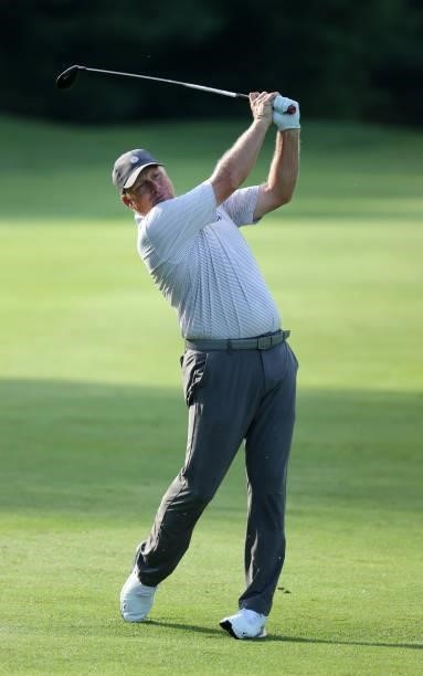 John Rollins plays his third shot on the 11th hole during the second round of the Barbasol Championship at Keene Trace Golf Club on July 16, 2021 in...