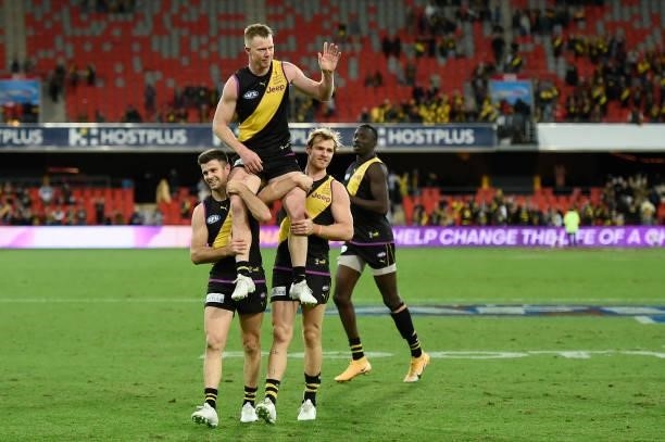 Jack Riewoldt of the Tigers is chaired off the field after his 300th match during the round 18 AFL match between the Richmond Tigers and the Brisbane...