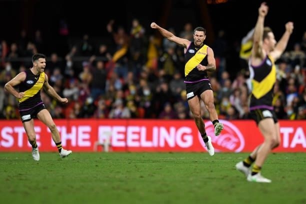 Jack Graham of the Tigers celebrates kicking a goal during the round 18 AFL match between the Richmond Tigers and the Brisbane Lions at Metricon...