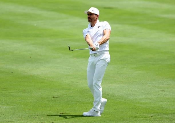 Camilo Villegas of Colombia plays his second shot on the first hole during the second round of the Barbasol Championship at Keene Trace Golf Club on...