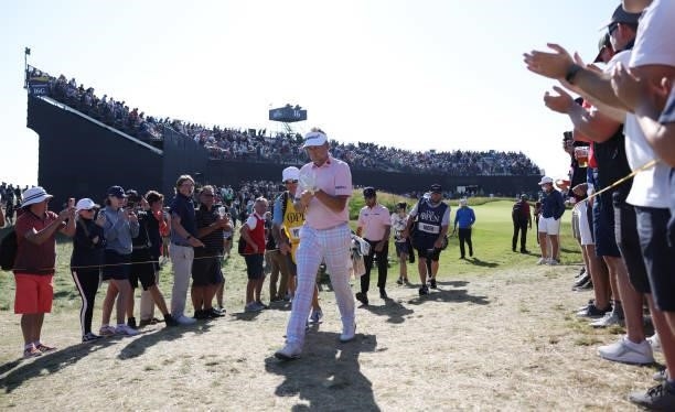 Ian Poulter of England walks from the 16th green during Day Two of The 149th Open at Royal St George’s Golf Club on July 16, 2021 in Sandwich,...