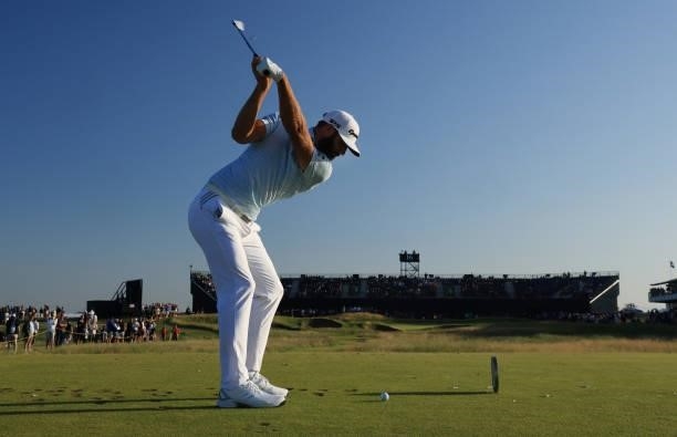 Dustin Johnson of The United States tees off on the 16th hole during Day Two of The 149th Open at Royal St George’s Golf Club on July 16, 2021 in...