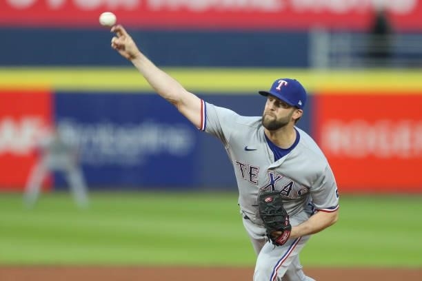 Jordan Lyles of the Texas Rangers throws a pitch during the first inning against the Toronto Blue Jays at Sahlen Field on July 16, 2021 in Buffalo,...