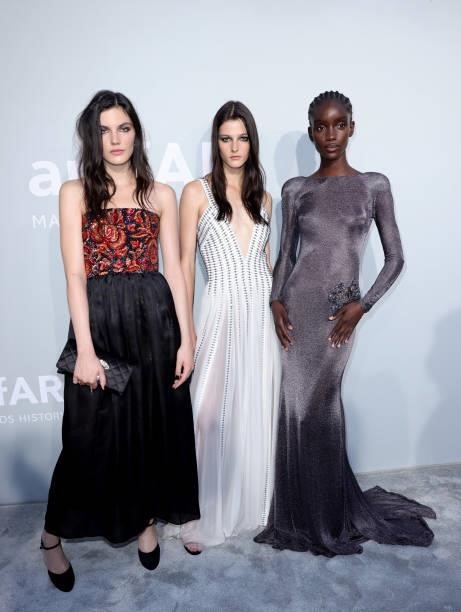 Lola Nicon, Effie Steinberg and Maty Falls attend the amfAR Cannes Gala 2021 at Villa Eilenroc on July 16, 2021 in Cap d'Antibes, France.