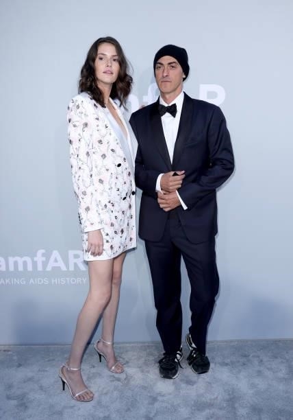 Vanessa Moody and a guest attend the amfAR Cannes Gala 2021 at Villa Eilenroc on July 16, 2021 in Cap d'Antibes, France.