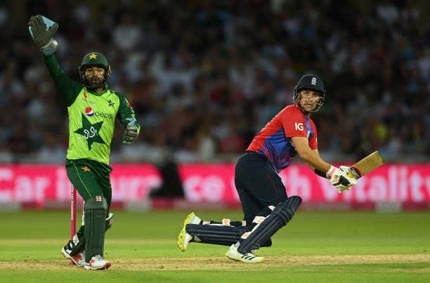 Liam Livingstone of England bats watched by Mohammad Rizwan of Pakistan during the 1st Vitality T20 International between England and Pakistan at...