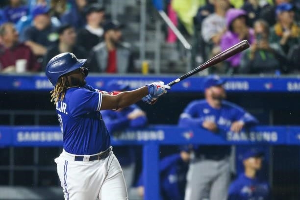 Vladimir Guerrero Jr. #27 of the Toronto Blue Jays hits a three-run home run during the sixth inning against the Texas Rangers at Sahlen Field on...