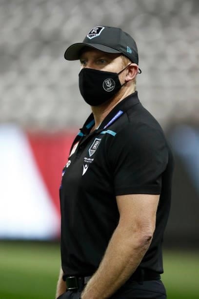 Port Adelaide senior assistant coach Michael Voss looks on in the warm up before the round 18 AFL match between St Kilda Saints and Port Adelaide...