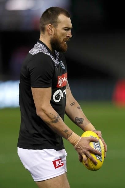 Charlie Dixon of the Power warms up before the round 18 AFL match between St Kilda Saints and Port Adelaide Power at Marvel Stadium on July 17, 2021...