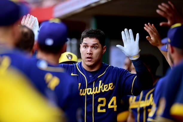 Avisail Garcia of the Milwaukee Brewers celebrates his solo home run in the second inning during their game against the Cincinnati Reds at Great...