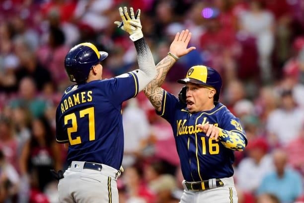 Willy Adames and Kolten Wong of the Milwaukee Brewers celebrate after Adame's two-run home run in the fifth inning during their game against the...