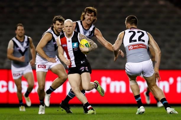 Zac Jones of the Saints runs with the ball during the round 18 AFL match between St Kilda Saints and Port Adelaide Power at Marvel Stadium on July...
