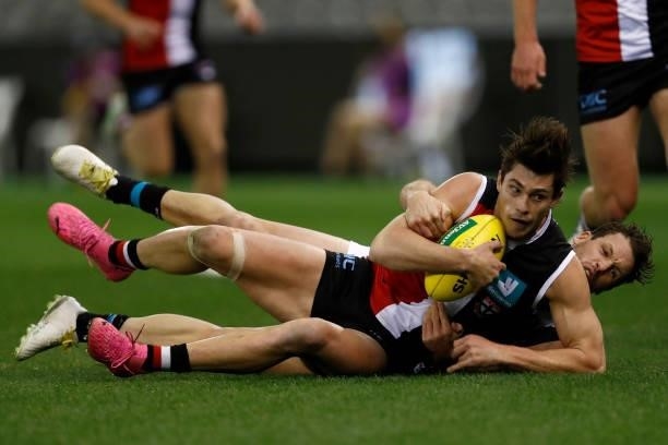 Travis Boak of the Power tackles Jack Steele of the Saints during the round 18 AFL match between St Kilda Saints and Port Adelaide Power at Marvel...