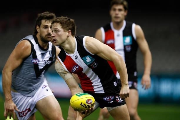 Jack Billings of the Saints handballs during the round 18 AFL match between St Kilda Saints and Port Adelaide Power at Marvel Stadium on July 17,...