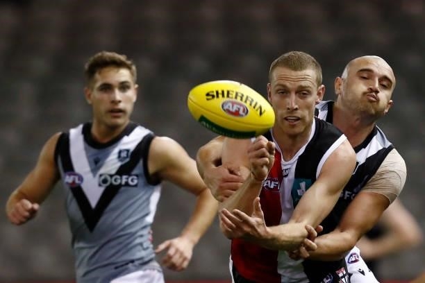 Callum Wilkie of the Saints handballs during the round 18 AFL match between St Kilda Saints and Port Adelaide Power at Marvel Stadium on July 17,...