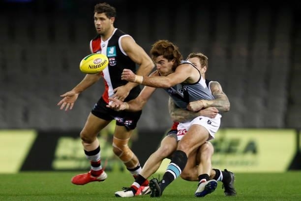 Tim Membrey of the Saints tackles Scott Lycett of the Power during the round 18 AFL match between St Kilda Saints and Port Adelaide Power at Marvel...