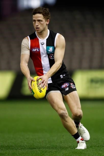 Jack Billings of the Saints runs with the ball during the round 18 AFL match between St Kilda Saints and Port Adelaide Power at Marvel Stadium on...