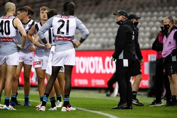 Port Adelaide senior assistant coach Michael Voss speaks to the player during the round 18 AFL match between St Kilda Saints and Port Adelaide Power...