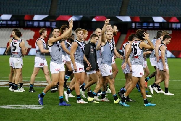 Port Adelaide players celebrate their win after the round 18 AFL match between St Kilda Saints and Port Adelaide Power at Marvel Stadium on July 17,...