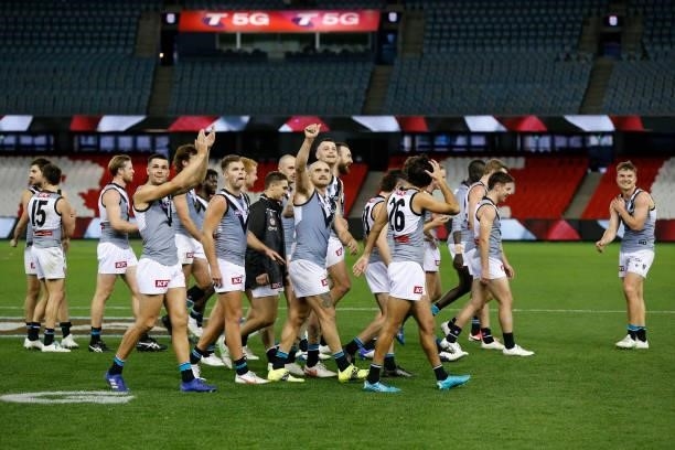 Port Adelaide players celebrate their win after the round 18 AFL match between St Kilda Saints and Port Adelaide Power at Marvel Stadium on July 17,...