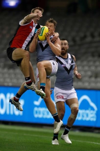 Ollie Wines of the Power marks the ball during the round 18 AFL match between St Kilda Saints and Port Adelaide Power at Marvel Stadium on July 17,...