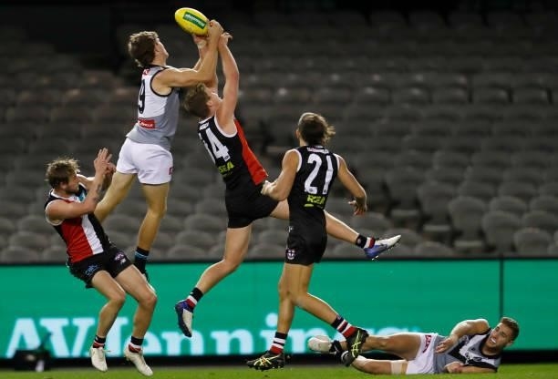 Mitch Georgiades of the Power and Thomas Highmore of the Saints compete during the round 18 AFL match between St Kilda Saints and Port Adelaide Power...