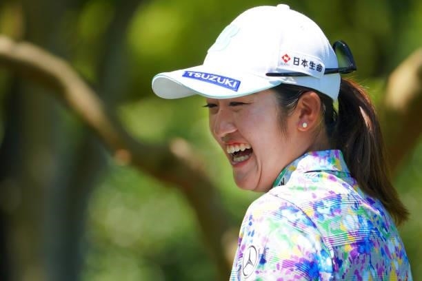 Mone Inami of Japan laughs on the 14th tee during the second round of the GMO Internet Ladies Samantha Thavasa Global Cup at Eagle Point Golf Club on...