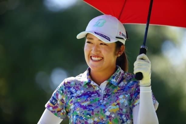 Mone Inami of Japan smiles after the birdie on the 15th green during the second round of the GMO Internet Ladies Samantha Thavasa Global Cup at Eagle...