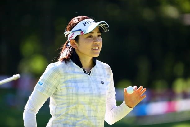 Sumika Nakasone of Japan acknowledges fans after holing out on the 18th green during the second round of the GMO Internet Ladies Samantha Thavasa...
