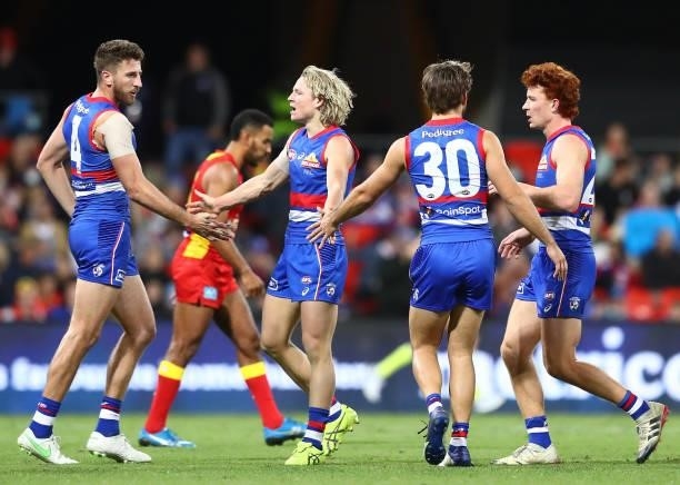 Cody Weightman of the Bulldogs celebrates after scoring a goal during the round 18 AFL match between Gold Coast Suns and Western Bulldogs at Metricon...