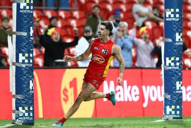 Alex Sexton of the Suns celebrates after scoring a goal during the round 18 AFL match between Gold Coast Suns and Western Bulldogs at Metricon...