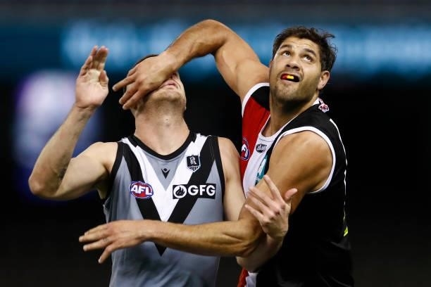 Peter Ladhams of the Power and Paddy Ryder of the Saints compete during the round 18 AFL match between St Kilda Saints and Port Adelaide Power at...