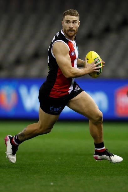 Dean Kent of the Saints runs with the ball during the round 18 AFL match between St Kilda Saints and Port Adelaide Power at Marvel Stadium on July...