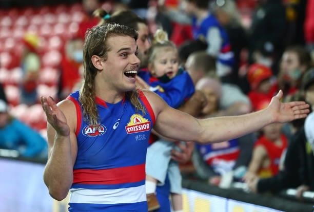 Bailey Smith of the Bulldogs celebrates after the Bulldogs defeated the Suns during the round 18 AFL match between Gold Coast Suns and Western...