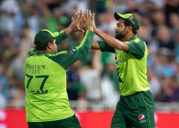 Haris Rauf of Pakistan celebrates with team mate Azam Khan after catching Eoin Morgan during the 1st T20I between England and Pakistan at Trent...