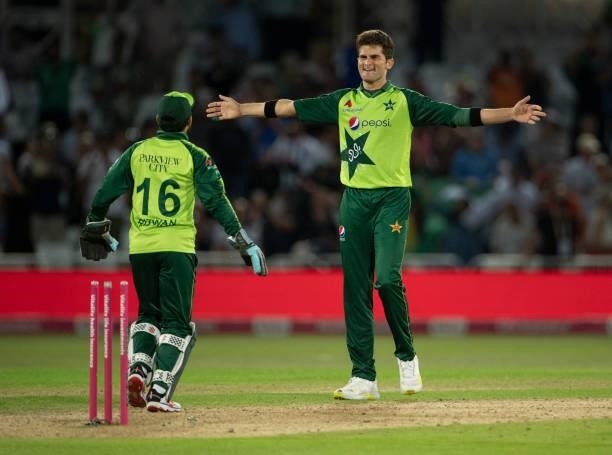 Shaheen Afridi of Pakistan celebrates the final wicket of Matt Parkinson of England with wicket keeper Mohammad Rizwan during the 1st T20I between...