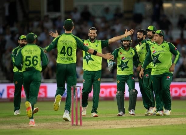 The Pakistan team celebrate getting the wicket of Liam Livingstone, bowled Shadab Khan and caught by Shaheen Afridi during the 1st T20I between...