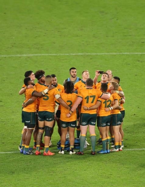 Australia team members huddle during the International Test Match between the Australian Wallabies and France at Suncorp Stadium on July 17, 2021 in...
