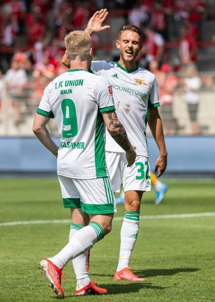 Andreas Voglsammer of 1.FC Union Berlin celebrates with teammates after scoring his team's second goal during the Pre-Season friendly match between...