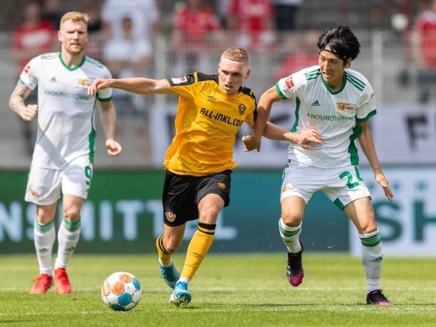 Luca Herrmann of Dynamo Dresden is challenged by Genki Haraguchi of 1.FC Union Berlin during the Pre-Season friendly match between 1. FC Union Berlin...