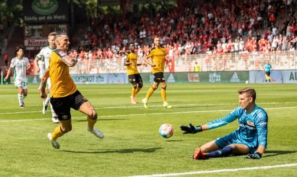 Goalkeeper Andreas Luthe of 1.FC Union Berlin saves a ball of Panagiotis Vlachodimos of Dynamo Dresden during the Pre-Season friendly match between...