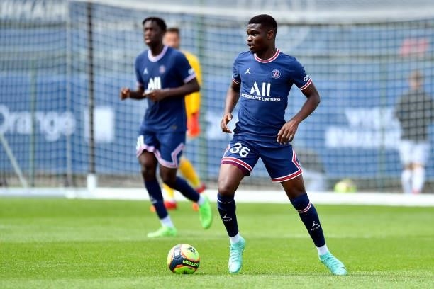 Eric Junior Dina Ebimbe of Paris Saint-Germain runs with the ball during the friendly match between Paris Saint-Germain and FC Chambly at Ooredoo...