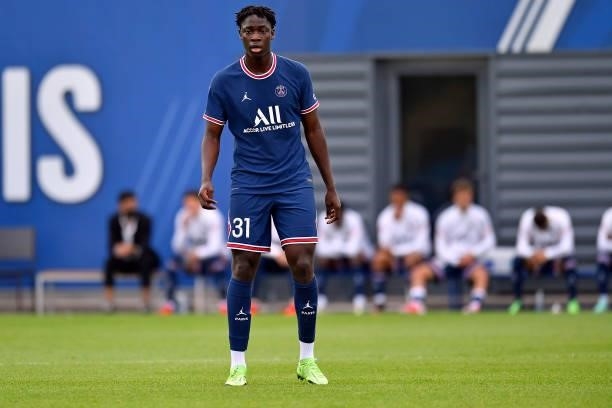 El Chadaille Bitshiabu of Paris Saint-Germain looks on during the friendly match between Paris Saint-Germain and FC Chambly at Ooredoo Center on July...