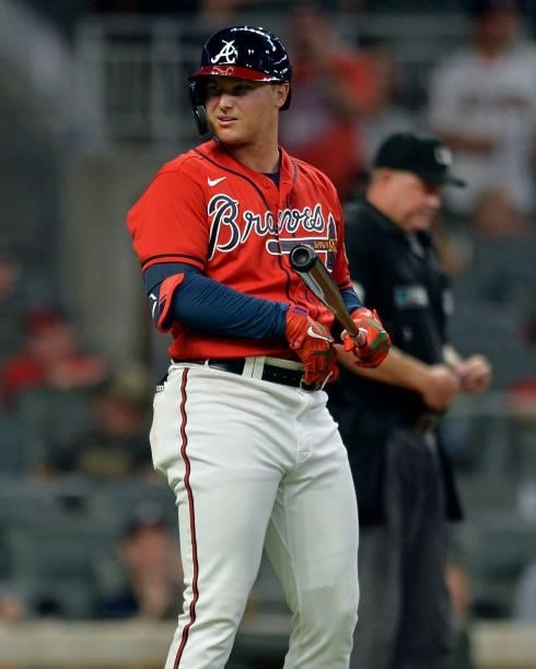 Joc Pederson of the Atlanta Braves looks back at the dugout during a game against the Tampa Bay Rays at Truist Park on July 16, 2021 in Atlanta,...