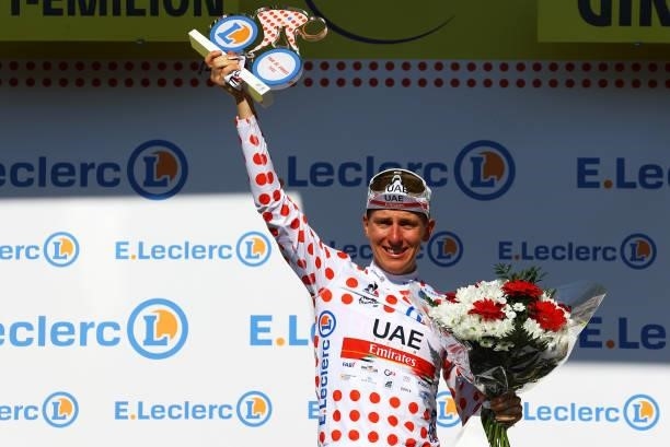 Tadej Pogačar of Slovenia and UAE-Team Emirates Polka Dot Mountain Jersey celebrates at podium during the 108th Tour de France 2021, Stage 20 a...
