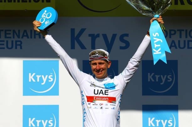 Tadej Pogačar of Slovenia and UAE-Team Emirates white best young jersey celebrates at podium during the 108th Tour de France 2021, Stage 20 a 30,8km...
